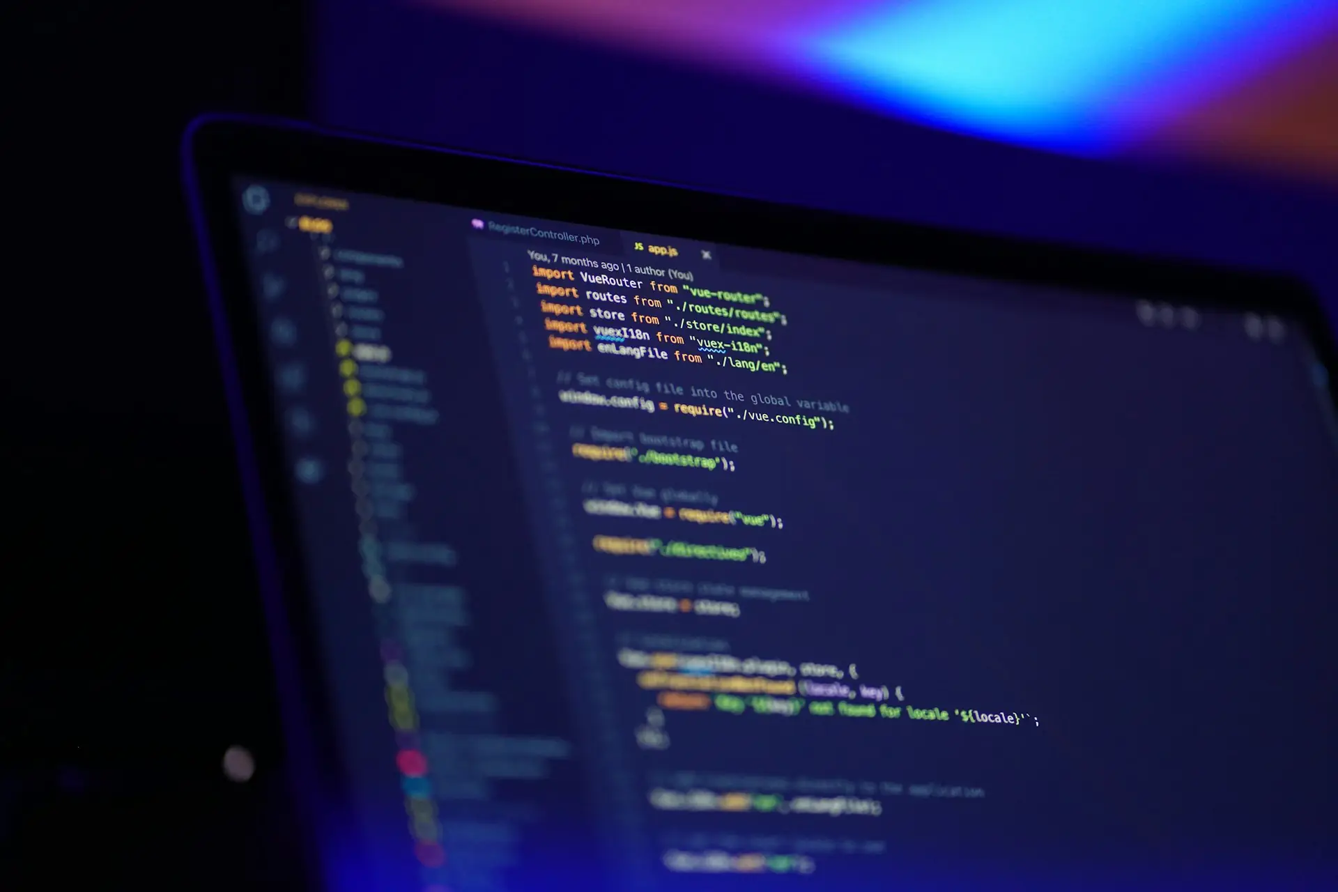 Close-up of program code on a dark screen